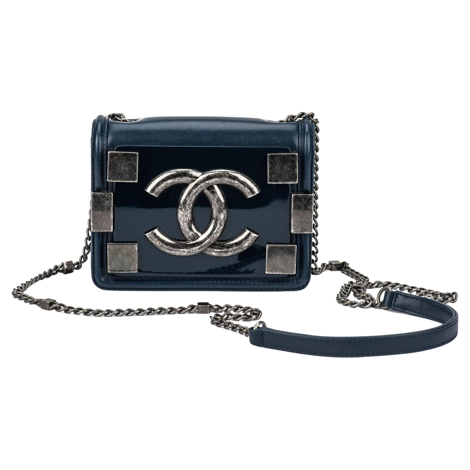 Chanel Boy Brick Flap Bag Navy Plexiglass Lambskin 2013/2014: Chanel Boy Brick Flap Bag Navy Plexiglass Lambskin 2013/2014 This exquisite Chanel Boy Brick Flap Bag in navy is a stunning accessory for any fashion enthusiast. Crafted from a combination of plexigla