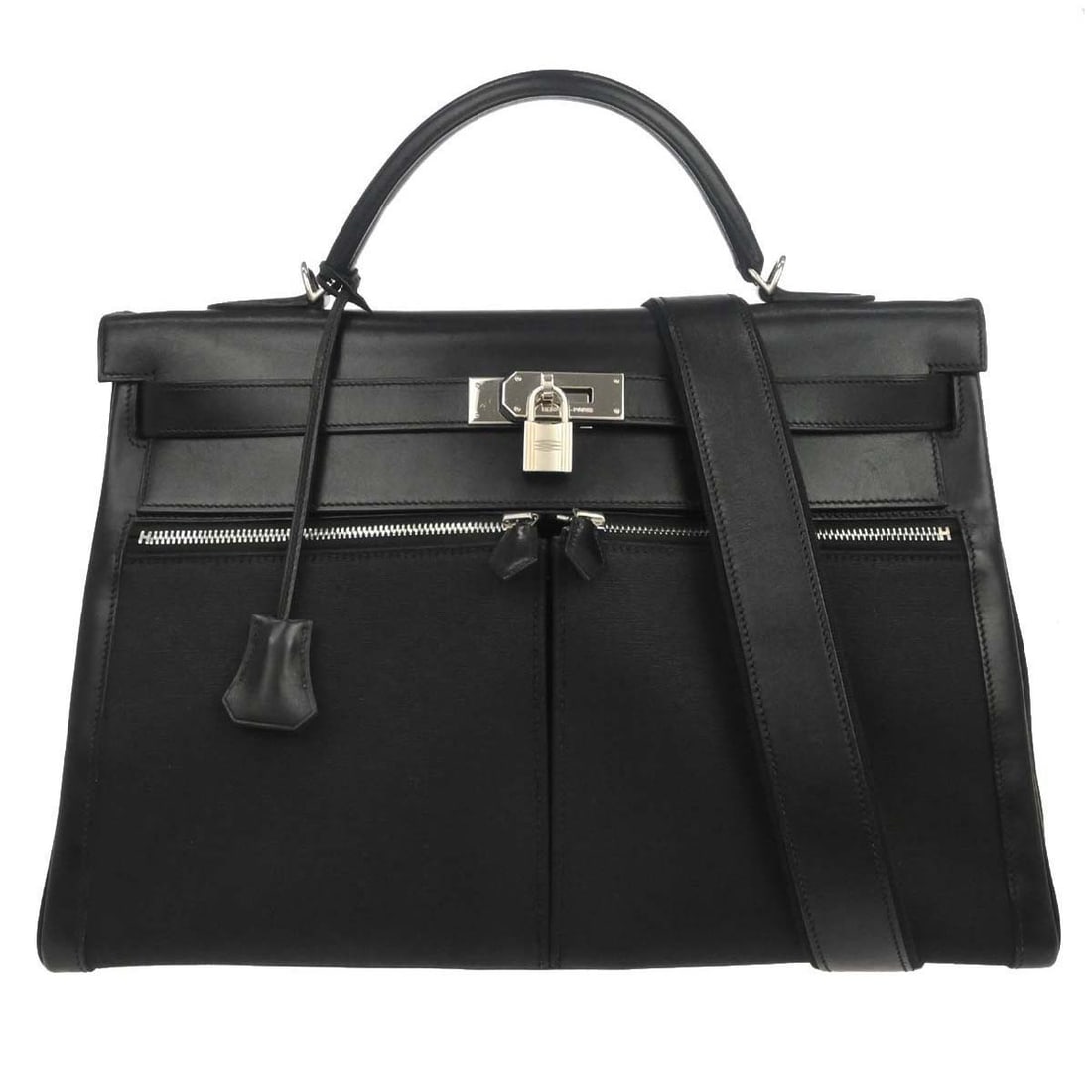 Hermes Kelly Lakis 40 Retourne Black Toile Officier Box Calf Bag: Hermes Kelly Lakis 40 Retourne Black Toile Officier Box Calf Bag Hermes Kelly Lakis 40 Retourne handbag in black Toile Officier and Box Calf. This women's satchel features a top handle, turn-lock clos