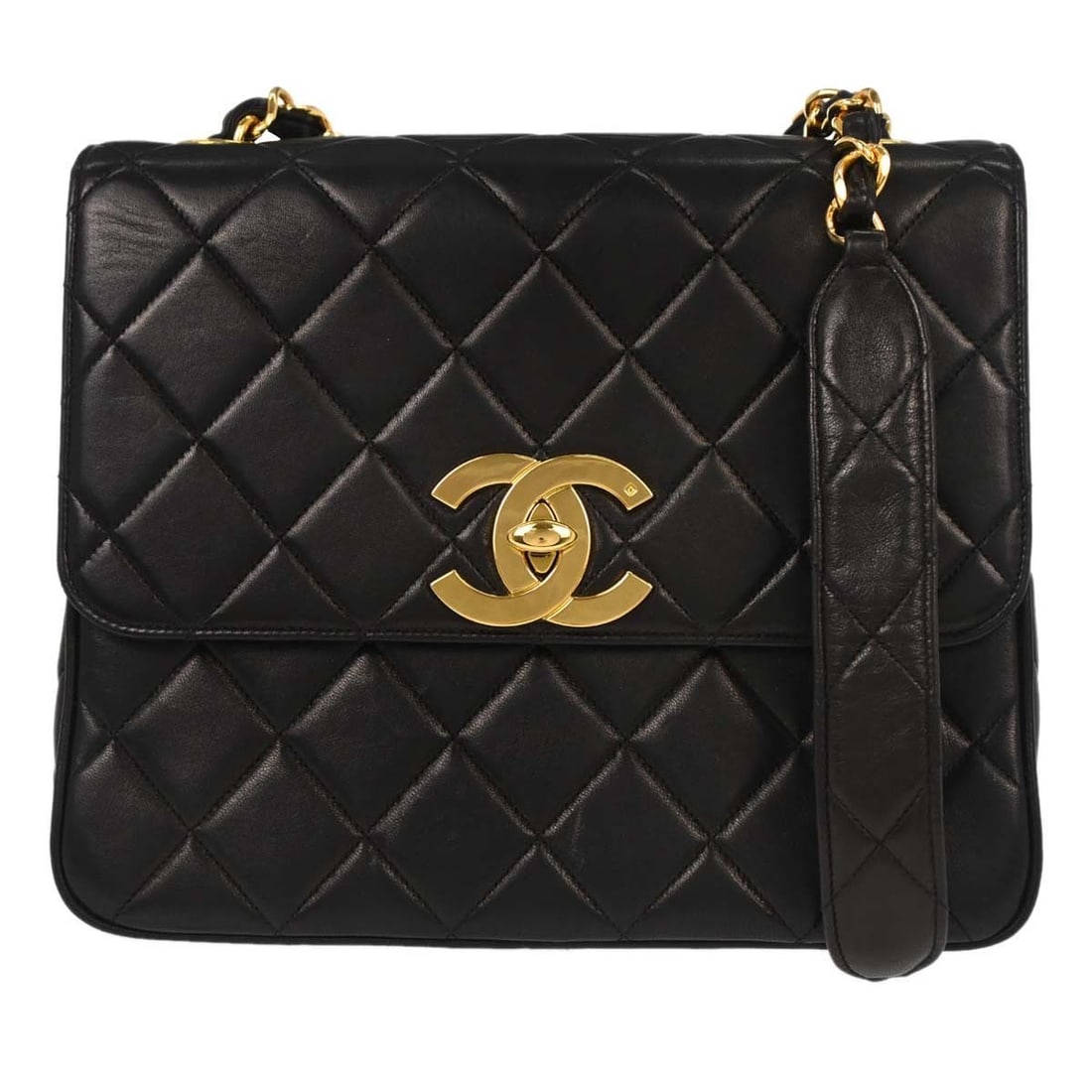 CHANEL Straight Flap Medium Shoulder Bag in Black Lambskin: CHANEL Straight Flap Medium Shoulder Bag in Black Lambskin Chanel Straight Flap shoulder bag in black lambskin with a leather lining and shoulder strap. This medium bag features pockets and includes t