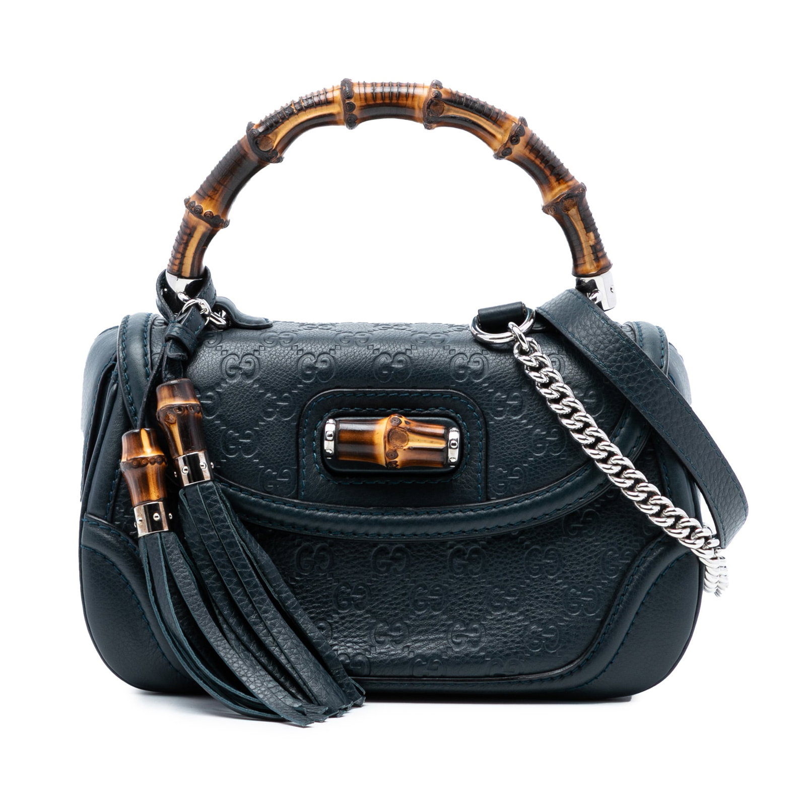 Gucci Guccissima Leather Satchel with Bamboo Handle and Tassel Accents: Gucci Guccissima Leather Satchel with Bamboo Handle and Tassel Accents This satchel features an embossed leather body with a bamboo top handle, leather tassel accents, a detachable chain and flat leat