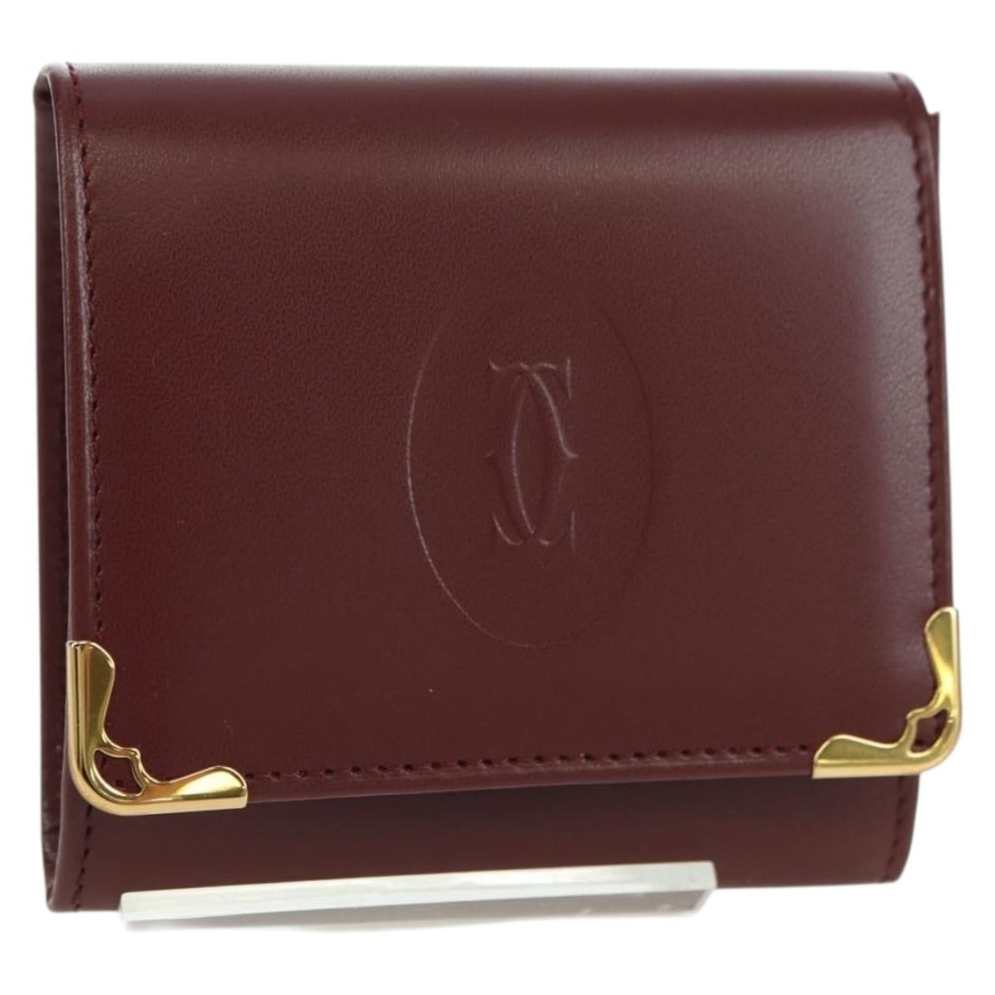 Cartier Must Line Leather Coin Purse Bordeaux with Dust Bag Card: Cartier Must Line Leather Coin Purse Bordeaux with Dust Bag Card Cartier Must Line coin purse in bordeaux leather with gold-tone detailing. Made in France, this women's coin purse includes the dust ba