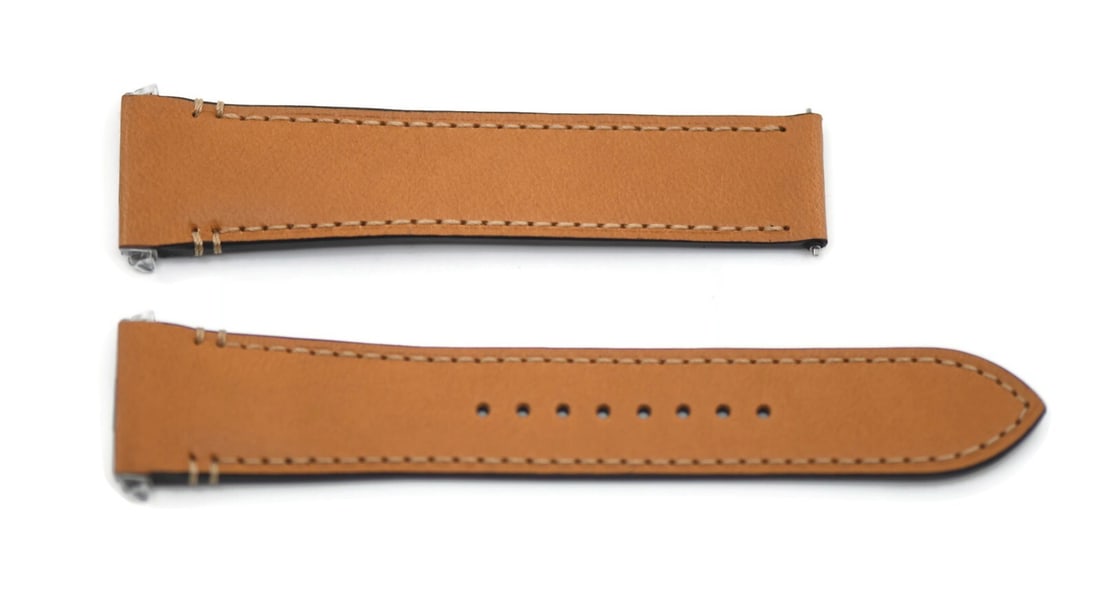 Cartier Santos Authentic Brown Leather Watch Strap 21mm: Cartier Santos Authentic Brown Leather Watch Strap 21mm This genuine Cartier Santos wristwatch band features a luxurious brown leather construction, designed for both style and comfort. With a band wi