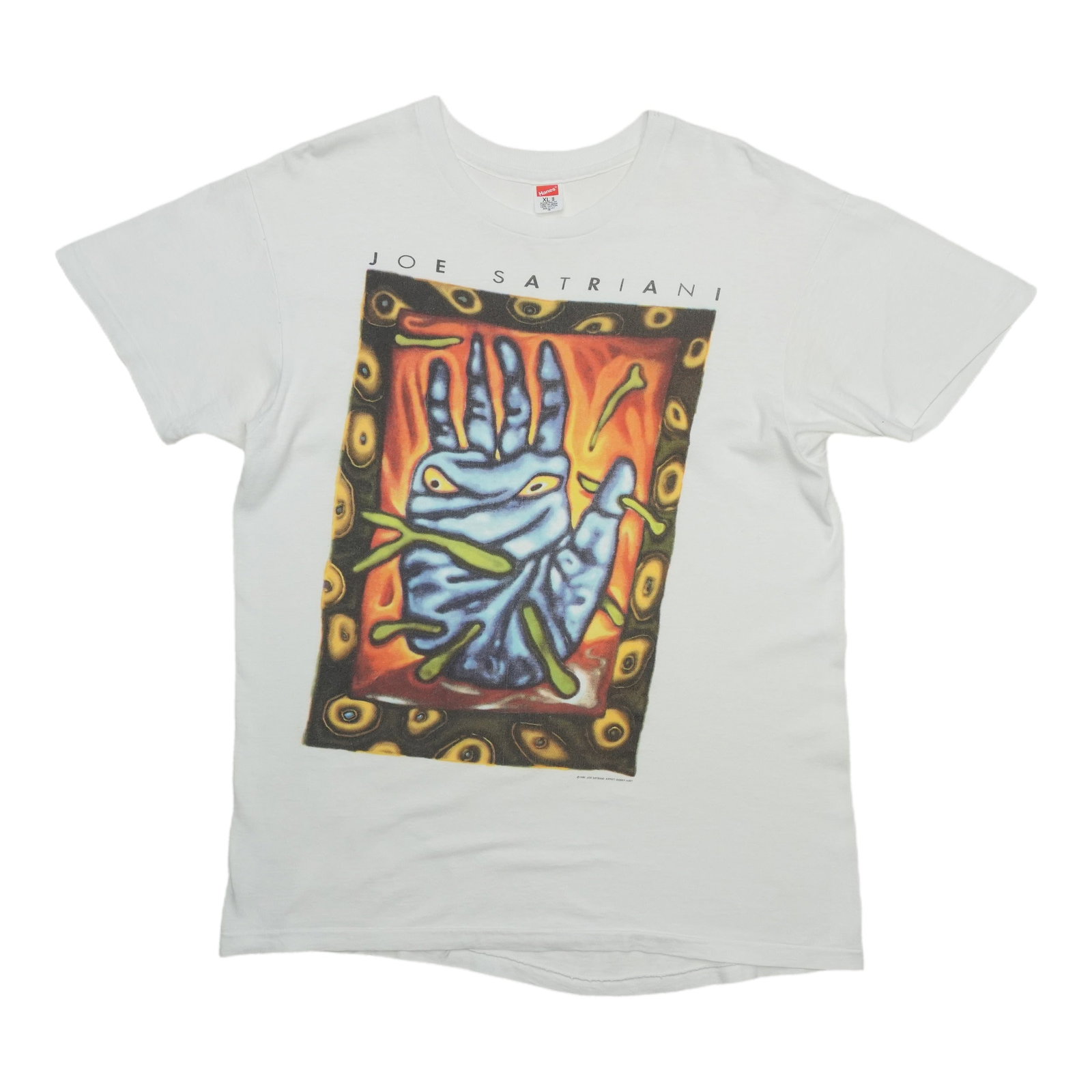 1990s Joe Satriani white cotton vintage tee XL: 1990s Joe Satriani white cotton vintage tee XL This is an original vintage 1990 Joe Satriani shirt, not a modern reproduction. The shirt is made from 100% cotton and comes in white. It is in excellent