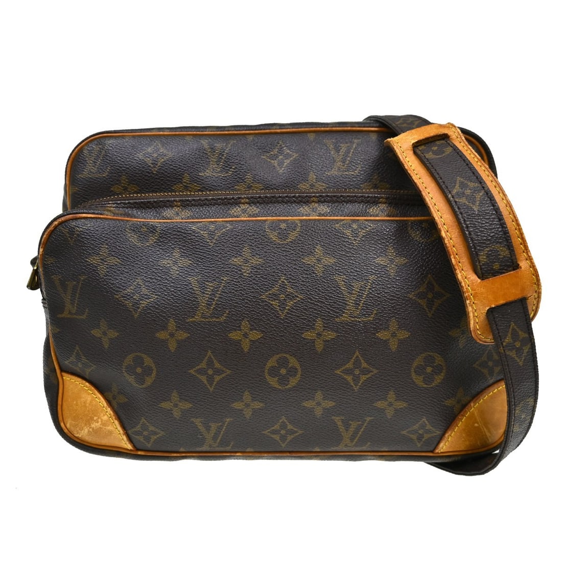 Louis Vuitton Nile Monogram Canvas Crossbody Bag M45244 France: Louis Vuitton Nile Monogram Canvas Crossbody Bag M45244 France Vintage Louis Vuitton Nile crossbody shoulder bag in brown Monogram canvas with leather trim. This medium bag features a zip closure, adj