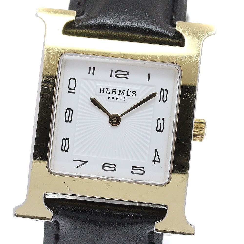 Hermes Quartz Unisex H Watch HH1.510 Wristwatch: Hermes Quartz Unisex H Watch HH1.510 Wristwatch This is a pre-owned HERMES HH1.510 H-Watch quartz wristwatch designed for unisex wear. Made in Switzerland, this timepiece combines the renowned craftsm