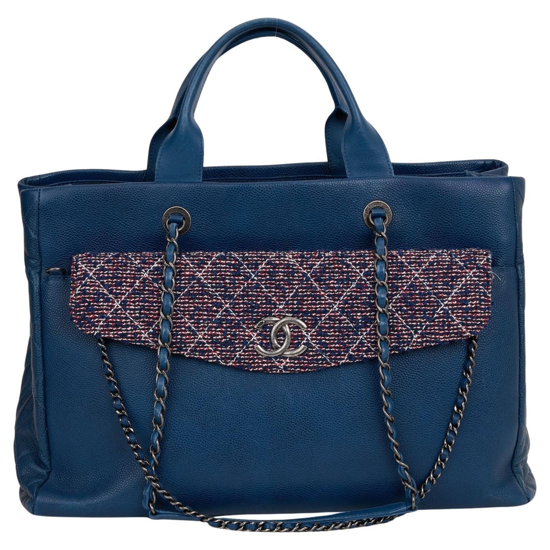 Chanel Break Shopping Tote Blue Caviar Leather and Tweed: Chanel Break Shopping Tote Blue Caviar Leather and Tweed The Chanel Break Shopping Tote showcases a sophisticated blend of blue caviar leather and tweed, making it a stylish addition to your accessory