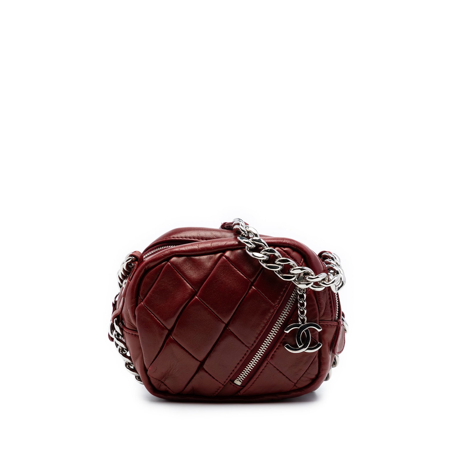 Chanel red quilted lambskin camera bag: Chanel red quilted lambskin camera bag This Chanel CC Quilted Lambskin Camera Bag features a luxurious quilted lambskin leather exterior in red, complemented by a curb chain strap. The design includes