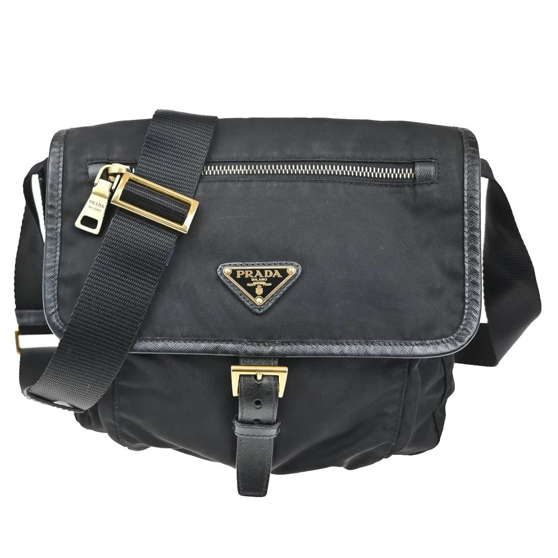 Prada Tessuto Nylon Buckle Messenger Crossbody Bag Black: Prada Tessuto Nylon Buckle Messenger Crossbody Bag Black The Prada Buckle Messenger Bag is crafted from black nylon and designed for women. This pre-owned bag is in very good condition, with some sign