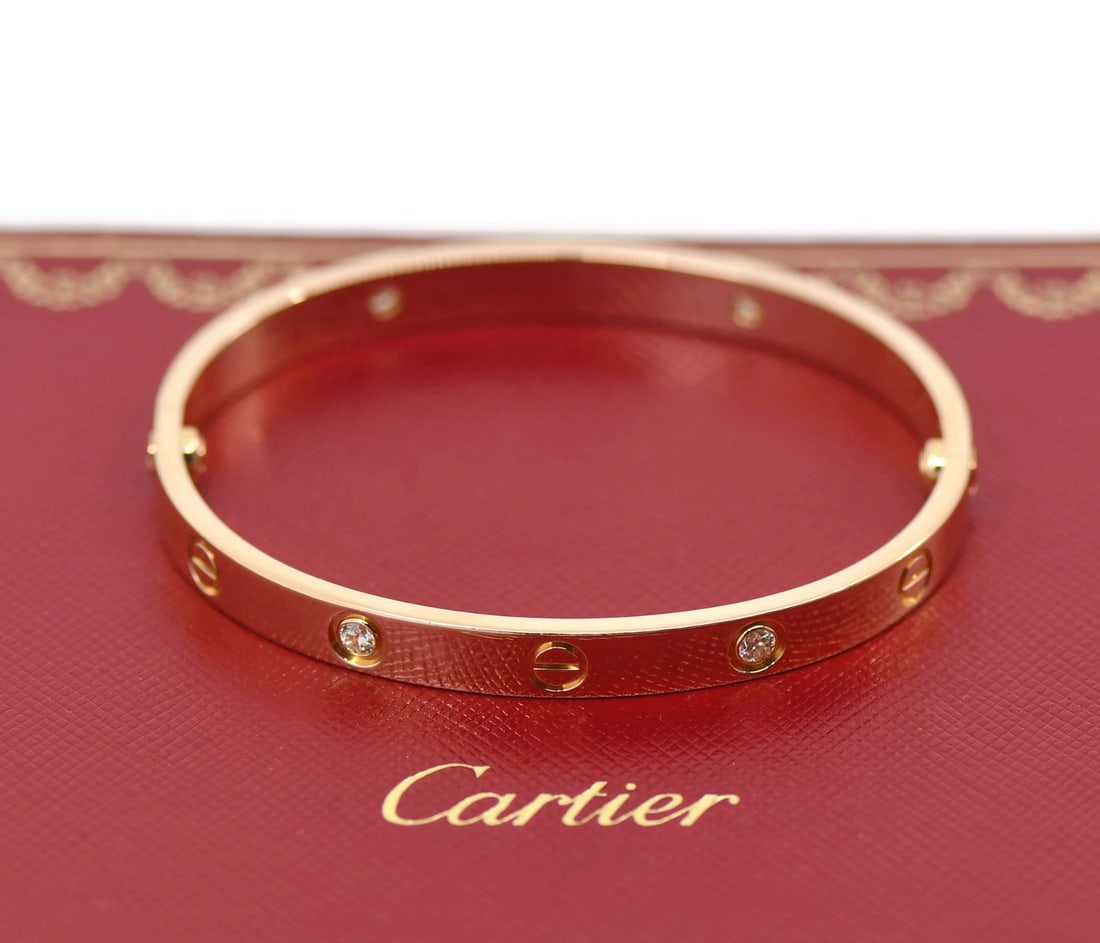 Cartier Love Bracelet 18K Rose Gold 4 Diamond Bangle Size 17: Cartier Love Bracelet 18K Rose Gold 4 Diamond Bangle Size 17 Pre-owned Cartier Love bracelet in 18k rose gold with four diamonds. This bangle-style bracelet is made in France and comes with a Cartier 