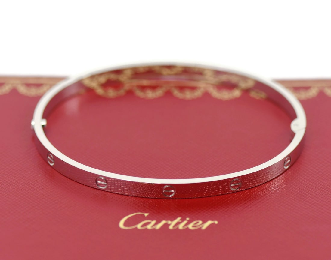 Medium Cartier Love Bangle Bracelet 18K White Gold Size 21 With Box: Medium Cartier Love Bangle Bracelet 18K White Gold Size 21 With Box This Cartier Love bracelet is crafted from 18K white gold in the medium model design. Featuring the iconic Love motif, this bangle s