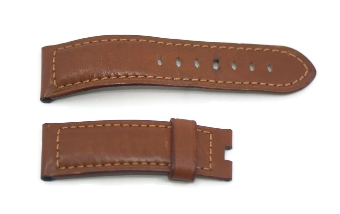 Authentic Panerai Brown Leather Watch Band 24mm: Authentic Panerai Brown Leather Watch Band 24mm This Panerai brown leather wristwatch band is crafted from high-quality leather, featuring a stylish brown color that complements any watch face. With a