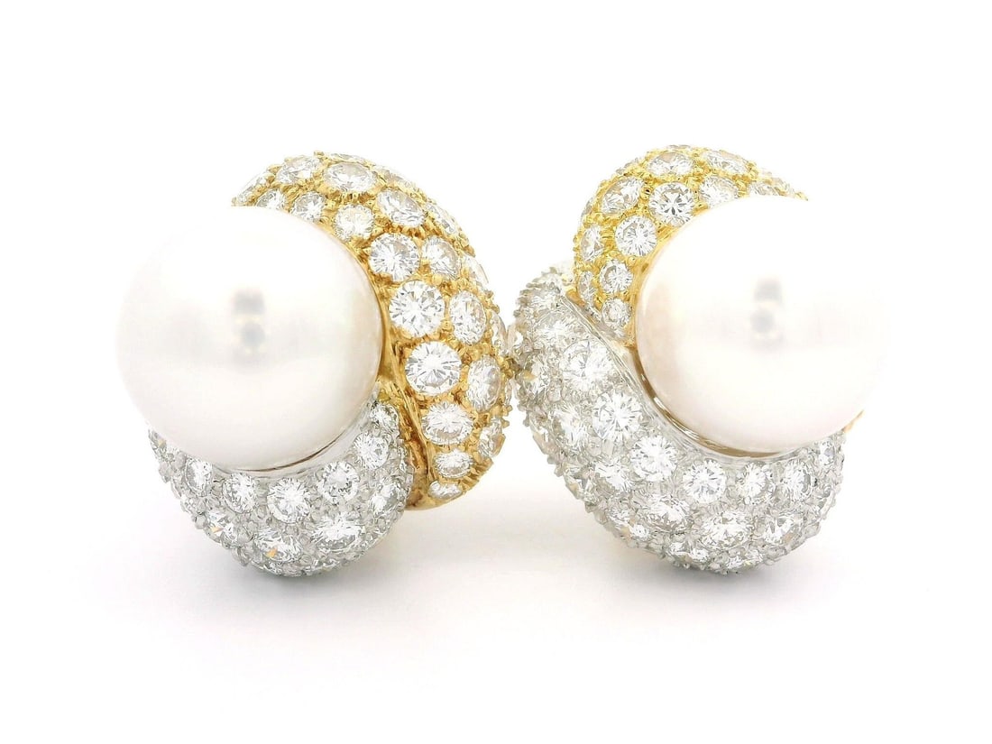 18k Gold South Sea Pearl Earrings with 8ctw Diamonds: 18k Gold South Sea Pearl Earrings with 8ctw Diamonds These exquisite earrings feature two genuine cultured South Sea pearls, each measuring 12.8mm, displaying a beautiful white color with a light pink