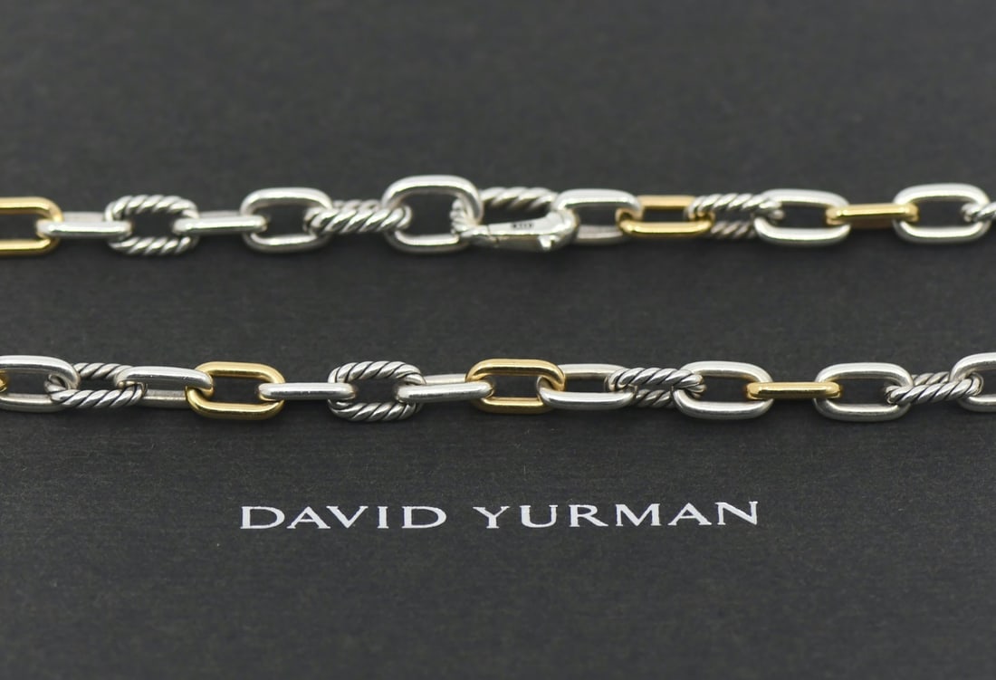 David Yurman Madison Chain Necklace 18K Gold Sterling Silver 24in: David Yurman Madison Chain Necklace 18K Gold Sterling Silver 24in David Yurman Madison chain necklace crafted in sterling silver and 18k yellow gold. This pre-owned necklace features a no-stone design