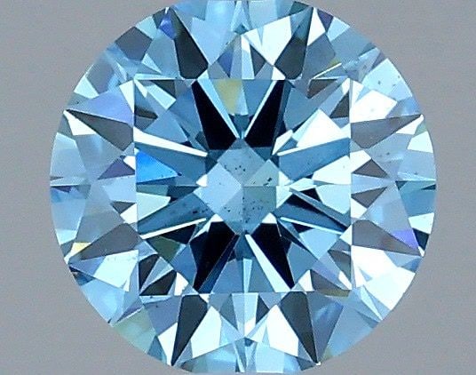 Loose Diamond - ROUND 1.0ct Fancy Vivid Blue VS2: Loose Diamond - ROUND 1.0ct Fancy Vivid Blue VS2 Source: This is a real non-mined Diamond that has been grown in a lab Shape: ROUND Carats: 1.0 Color: Fancy Vivid Blue Certification: IGI Video: