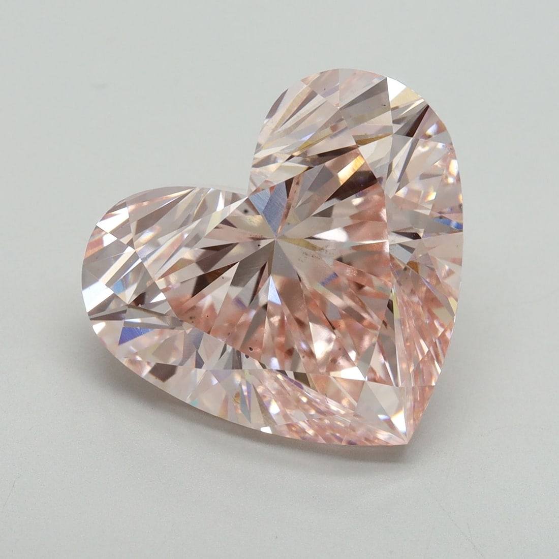 Loose Diamond - HEART 10.06ct Fancy Intense Pink VS2: Loose Diamond - HEART 10.06ct Fancy Intense Pink VS2 Source: This is a real non-mined Diamond that has been grown in a lab Shape: HEART Carats: 10.06 Color: Fancy Intense Pink Certification: IGI Video
