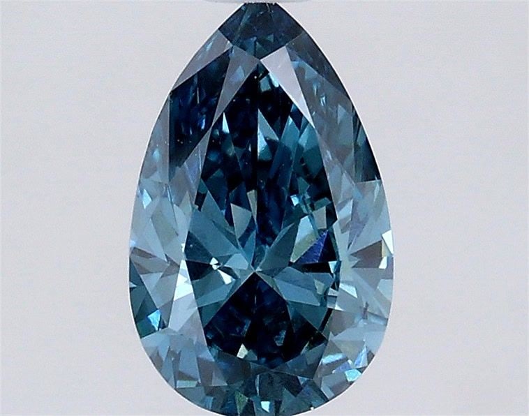 Loose Diamond - PEAR 0.64ct Fancy Vivid Blue VS1: Loose Diamond - PEAR 0.64ct Fancy Vivid Blue VS1 Source: This is a real non-mined Diamond that has been grown in a lab Shape: PEAR Carats: 0.64 Color: Fancy Vivid Blue Certification: IGI Video: