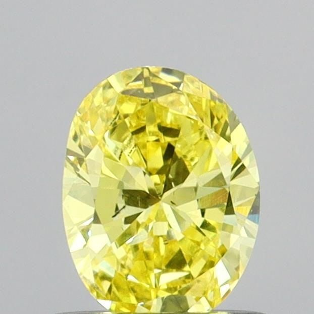 Loose Diamond - OVAL 0.55ct Fancy Vivid Yellow SI1: Loose Diamond - OVAL 0.55ct Fancy Vivid Yellow SI1 Source: This is a real non-mined Diamond that has been grown in a lab Shape: OVAL Carats: 0.55 Color: Fancy Vivid Yellow Certification: IGI Video: