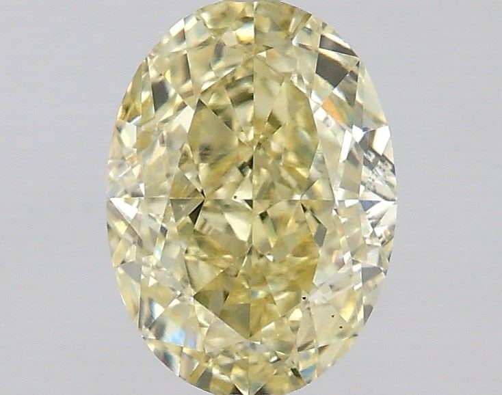 Loose Diamond - OVAL 1.07ct Fancy Yellow VS1: Loose Diamond - OVAL 1.07ct Fancy Yellow VS1 Source: This is a real non-mined Diamond that has been grown in a lab Shape: OVAL Carats: 1.07 Color: Fancy Yellow Certification: IGI Video: