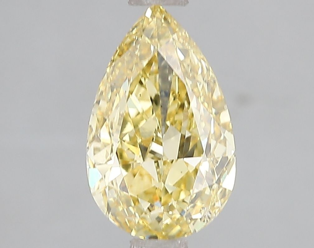 Loose Diamond - PEAR 2.01ct Fancy Vivid Yellow SI1: Loose Diamond - PEAR 2.01ct Fancy Vivid Yellow SI1 Source: This is a real non-mined Diamond that has been grown in a lab Shape: PEAR Carats: 2.01 Color: Fancy Vivid Yellow Certification: IGI Video: