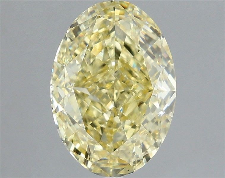 Loose Diamond - OVAL 3.02ct Fancy Yellow VS2: Loose Diamond - OVAL 3.02ct Fancy Yellow VS2 Source: This is a real non-mined Diamond that has been grown in a lab Shape: OVAL Carats: 3.02 Color: Fancy Yellow Certification: IGI Video: