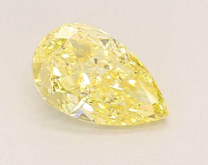 Loose Diamond - PEAR 1.54ct Fancy Vivid Yellow VS1: Loose Diamond - PEAR 1.54ct Fancy Vivid Yellow VS1 Source: This is a real non-mined Diamond that has been grown in a lab Shape: PEAR Carats: 1.54 Color: Fancy Vivid Yellow Certification: IGI Video: