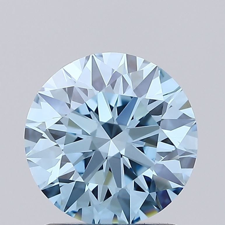 Ideal Loose Diamond - ROUND 1.54ct Fancy Vivid Blue VVS1: Ideal Loose Diamond - ROUND 1.54ct Fancy Vivid Blue VVS1 Source: This is a real non-mined Diamond that has been grown in a lab Shape: ROUND Carats: 1.54 Color: Fancy Vivid Blue Certification: IGI Vide