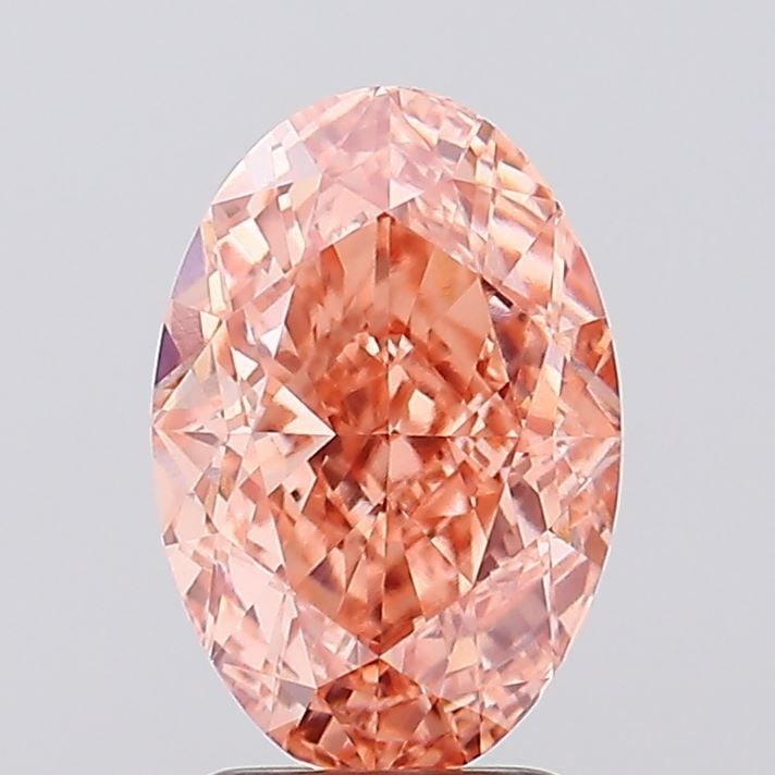 Loose Diamond - OVAL 3.08ct Fancy Vivid Orangey Pink VVS2: Loose Diamond - OVAL 3.08ct Fancy Vivid Orangey Pink VVS2 Source: This is a real non-mined Diamond that has been grown in a lab Shape: OVAL Carats: 3.08 Color: Fancy Vivid Orangey Pink Certification: