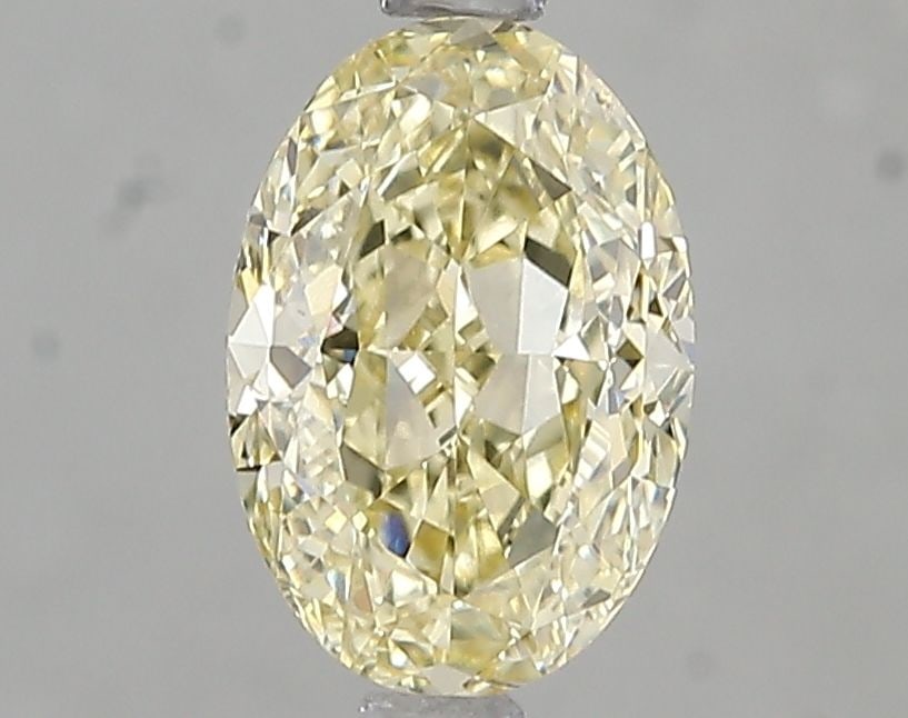 Loose Diamond - OVAL 1.57ct Fancy Yellow VS2: Loose Diamond - OVAL 1.57ct Fancy Yellow VS2 Source: This is a real non-mined Diamond that has been grown in a lab Shape: OVAL Carats: 1.57 Color: Fancy Yellow Certification: IGI Video:
