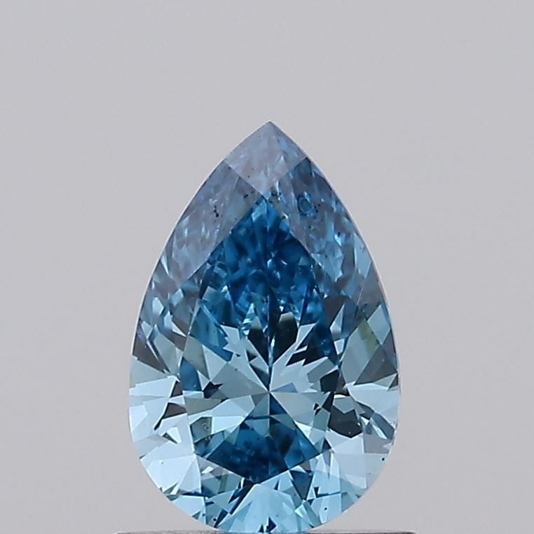 Loose Diamond - PEAR 0.74ct Fancy Vivid Blue VVS2: Loose Diamond - PEAR 0.74ct Fancy Vivid Blue VVS2 Source: This is a real non-mined Diamond that has been grown in a lab Shape: PEAR Carats: 0.74 Color: Fancy Vivid Blue Certification: IGI Video: