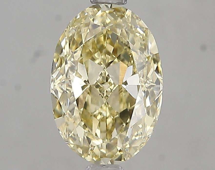Loose Diamond - OVAL 2.09ct Fancy Yellow VS2: Loose Diamond - OVAL 2.09ct Fancy Yellow VS2 Source: This is a real non-mined Diamond that has been grown in a lab Shape: OVAL Carats: 2.09 Color: Fancy Yellow Certification: IGI Video: