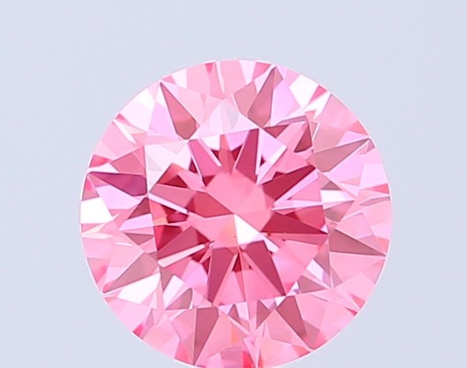 Ideal Loose Diamond - ROUND 1.09ct Fancy Vivid Pink VS1: Ideal Loose Diamond - ROUND 1.09ct Fancy Vivid Pink VS1 Source: This is a real non-mined Diamond that has been grown in a lab Shape: ROUND Carats: 1.09 Color: Fancy Vivid Pink Certification: IGI Video