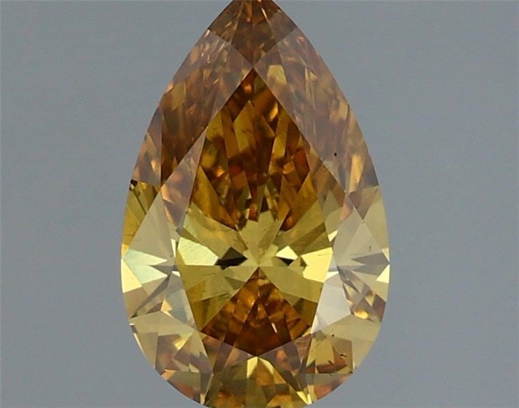 Loose Diamond - PEAR 1.15ct Fancy Intense Brownish Yellow VS1: Loose Diamond - PEAR 1.15ct Fancy Intense Brownish Yellow VS1 Source: This is a real non-mined Diamond that has been grown in a lab Shape: PEAR Carats: 1.15 Color: Fancy Intense Brownish Yellow Certif