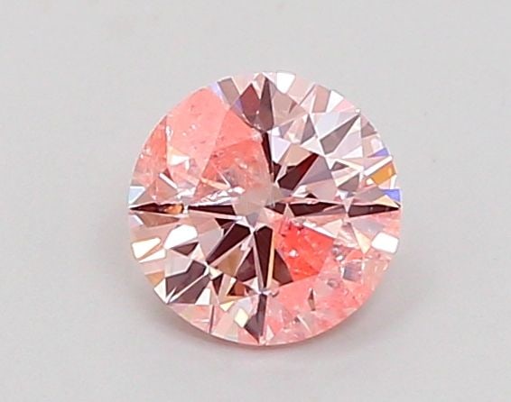 Loose Diamond - ROUND 0.71ct Fancy Pink I2: Loose Diamond - ROUND 0.71ct Fancy Pink I2 Source: This is a real non-mined Diamond that has been grown in a lab Shape: ROUND Carats: 0.71 Color: Fancy Pink Certification: IGI Video: