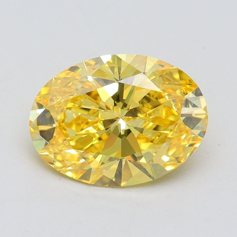 Loose Diamond - OVAL 2.02ct Fancy Vivid Yellow VVS2: Loose Diamond - OVAL 2.02ct Fancy Vivid Yellow VVS2 Source: This is a real non-mined Diamond that has been grown in a lab Shape: OVAL Carats: 2.02 Color: Fancy Vivid Yellow Certification: IGI Video: