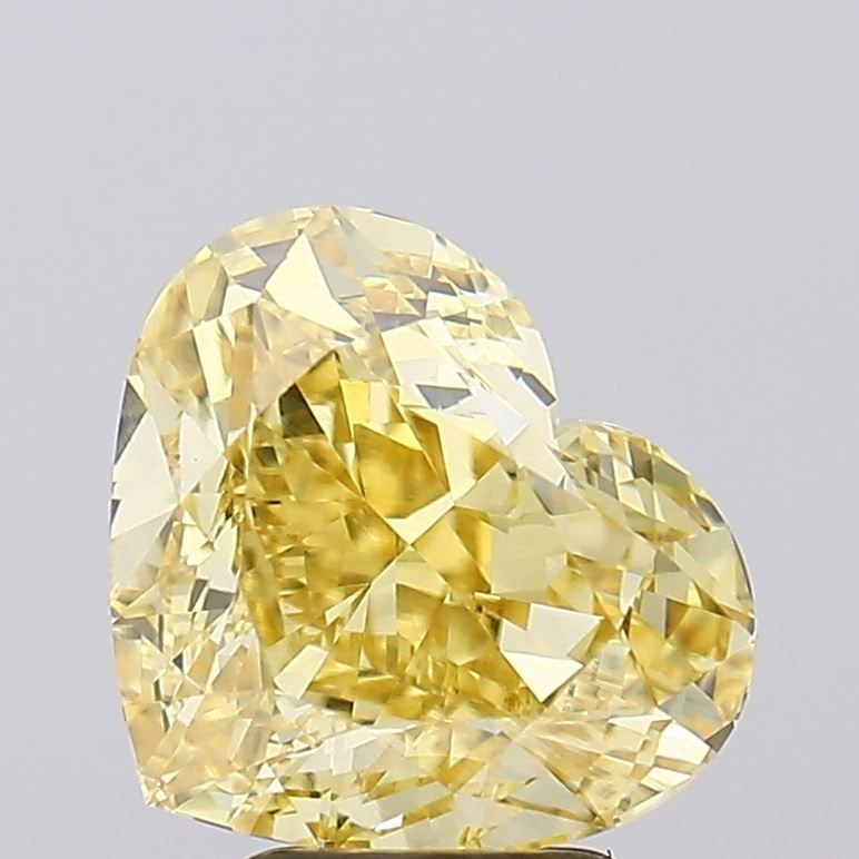 Loose Diamond - HEART 5.07ct Fancy Intense Yellow VVS2: Loose Diamond - HEART 5.07ct Fancy Intense Yellow VVS2 Source: This is a real non-mined Diamond that has been grown in a lab Shape: HEART Carats: 5.07 Color: Fancy Intense Yellow Certification: IGI Vi