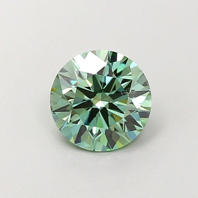 Ideal Loose Diamond - ROUND 1.04ct Fancy Vivid Green SI1: Ideal Loose Diamond - ROUND 1.04ct Fancy Vivid Green SI1 Source: This is a real non-mined Diamond that has been grown in a lab Shape: ROUND Carats: 1.04 Color: Fancy Vivid Green Certification: IGI Vid