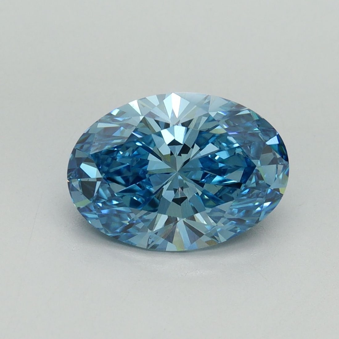 Loose Diamond - OVAL 2.18ct Fancy Vivid Blue VS1: Loose Diamond - OVAL 2.18ct Fancy Vivid Blue VS1 Source: This is a real non-mined Diamond that has been grown in a lab Shape: OVAL Carats: 2.18 Color: Fancy Vivid Blue Certification: IGI Video: