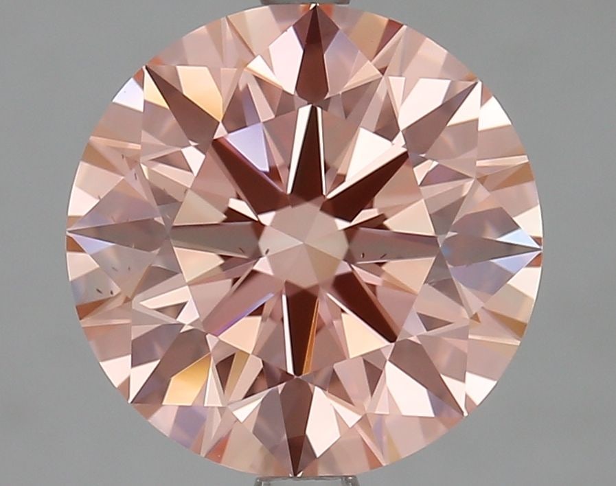 Ideal Loose Diamond - ROUND 3.01ct Fancy Vivid Pink VS2: Ideal Loose Diamond - ROUND 3.01ct Fancy Vivid Pink VS2 Source: This is a real non-mined Diamond that has been grown in a lab Shape: ROUND Carats: 3.01 Color: Fancy Vivid Pink Certification: IGI Video