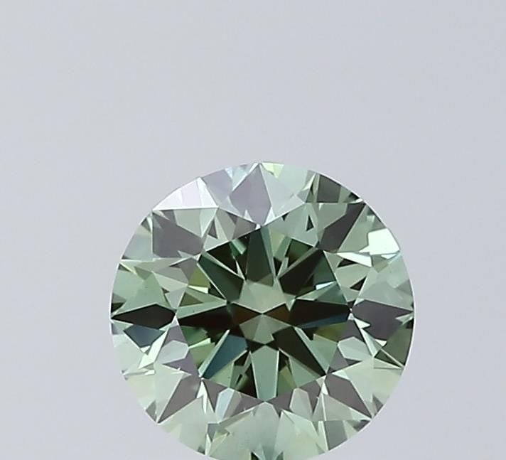 Ideal Loose Diamond - ROUND 1.03ct Fancy Vivid Green VS1: Ideal Loose Diamond - ROUND 1.03ct Fancy Vivid Green VS1 Source: This is a real non-mined Diamond that has been grown in a lab Shape: ROUND Carats: 1.03 Color: Fancy Vivid Green Certification: IGI Vid