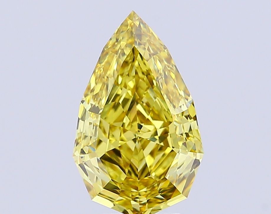 Loose Diamond - PEAR 6.01ct Fancy Vivid Yellow VS1: Loose Diamond - PEAR 6.01ct Fancy Vivid Yellow VS1 Source: This is a real non-mined Diamond that has been grown in a lab Shape: PEAR Carats: 6.01 Color: Fancy Vivid Yellow Certification: IGI Video: