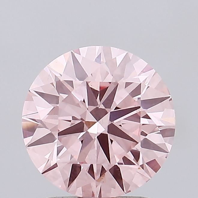 Ideal Loose Diamond - ROUND 1.99ct Fancy Vivid Pink VS1: Ideal Loose Diamond - ROUND 1.99ct Fancy Vivid Pink VS1 Source: This is a real non-mined Diamond that has been grown in a lab Shape: ROUND Carats: 1.99 Color: Fancy Vivid Pink Certification: IGI PLEAS
