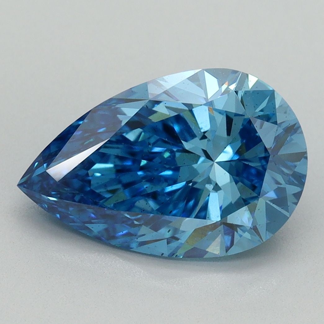 Loose Diamond - PEAR 3.08ct Fancy Vivid Blue SI1: Loose Diamond - PEAR 3.08ct Fancy Vivid Blue SI1 Source: This is a real non-mined Diamond that has been grown in a lab Shape: PEAR Carats: 3.08 Color: Fancy Vivid Blue Certification: IGI Video: