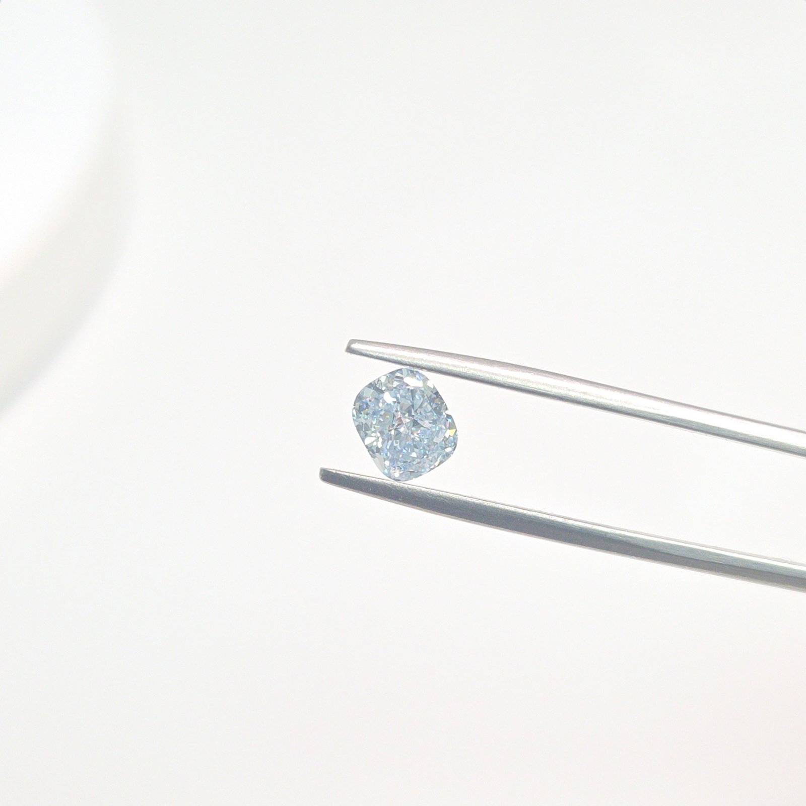 Loose Diamond - CUSHION MODIFIED 1.11ct Fancy Light Blue VS1: Loose Diamond - CUSHION MODIFIED 1.11ct Fancy Light Blue VS1 Source: This is a real non-mined Diamond that has been grown in a lab Shape: CUSHION MODIFIED Carats: 1.11 Color: Fancy Light Blue Certific