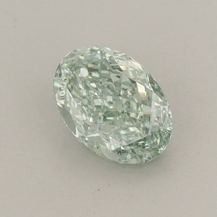 Loose Diamond - OVAL 0.54ct Fancy Vivid Green VS2: Loose Diamond - OVAL 0.54ct Fancy Vivid Green VS2 Source: This is a real non-mined Diamond that has been grown in a lab Shape: OVAL Carats: 0.54 Color: Fancy Vivid Green Certification: IGI PLEASE NOTE