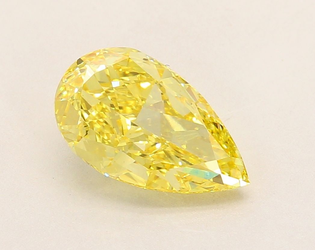 Loose Diamond - PEAR 2.94ct Fancy Vivid Yellow VVS2: Loose Diamond - PEAR 2.94ct Fancy Vivid Yellow VVS2 Source: This is a real non-mined Diamond that has been grown in a lab Shape: PEAR Carats: 2.94 Color: Fancy Vivid Yellow Certification: IGI Video: