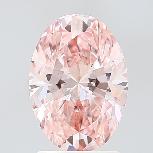 Loose Diamond - OVAL 2.1ct Fancy Vivid Pink VS2: Loose Diamond - OVAL 2.1ct Fancy Vivid Pink VS2 Source: This is a real non-mined Diamond that has been grown in a lab Shape: OVAL Carats: 2.1 Color: Fancy Vivid Pink Certification: IGI Video: