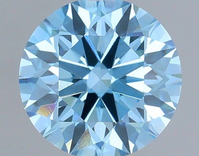 Ideal Loose Diamond - ROUND 0.71ct Fancy Vivid Blue VS2: Ideal Loose Diamond - ROUND 0.71ct Fancy Vivid Blue VS2 Source: This is a real non-mined Diamond that has been grown in a lab Shape: ROUND Carats: 0.71 Color: Fancy Vivid Blue Certification: IGI Video