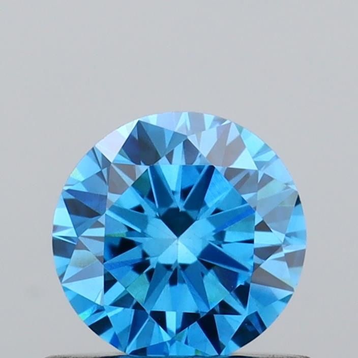 Loose Diamond - ROUND 0.56ct Fancy Vivid Blue VS1: Loose Diamond - ROUND 0.56ct Fancy Vivid Blue VS1 Source: This is a real non-mined Diamond that has been grown in a lab Shape: ROUND Carats: 0.56 Color: Fancy Vivid Blue Certification: IGI Video: