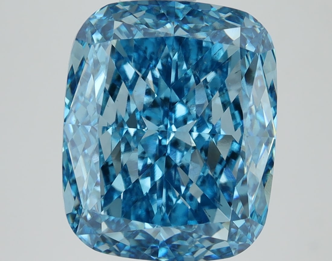 Loose Diamond - CUSHION 6.01ct BLUE VS2: Loose Diamond - CUSHION 6.01ct BLUE VS2 Source: This is a real non-mined Diamond that has been grown in a lab Shape: CUSHION Carats: 6.01 Color: BLUE Clarity: VS2 Certification: IGI Condition: Pre-Own