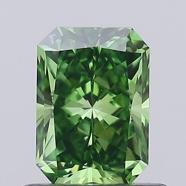 Loose Diamond - RADIANT 0.78ct Fancy Vivid Green VVS2: Loose Diamond - RADIANT 0.78ct Fancy Vivid Green VVS2 Source: This is a real non-mined Diamond that has been grown in a lab Shape: RADIANT Carats: 0.78 Color: Fancy Vivid Green Certification: IGI Vide